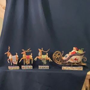 Jim Shore “Delivering Joy” Full Set with sleigh, blue, green and red reindeer.